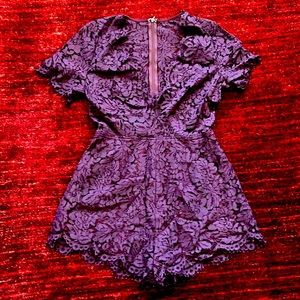 Cute lace romper for the summer. Size M/ 6 US. NWOT
